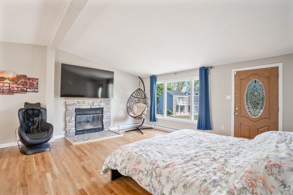 55 Gates Road Saugus, MA 01906 - Photo 10 of 42 a bedroom with a bed and a flat screen tv