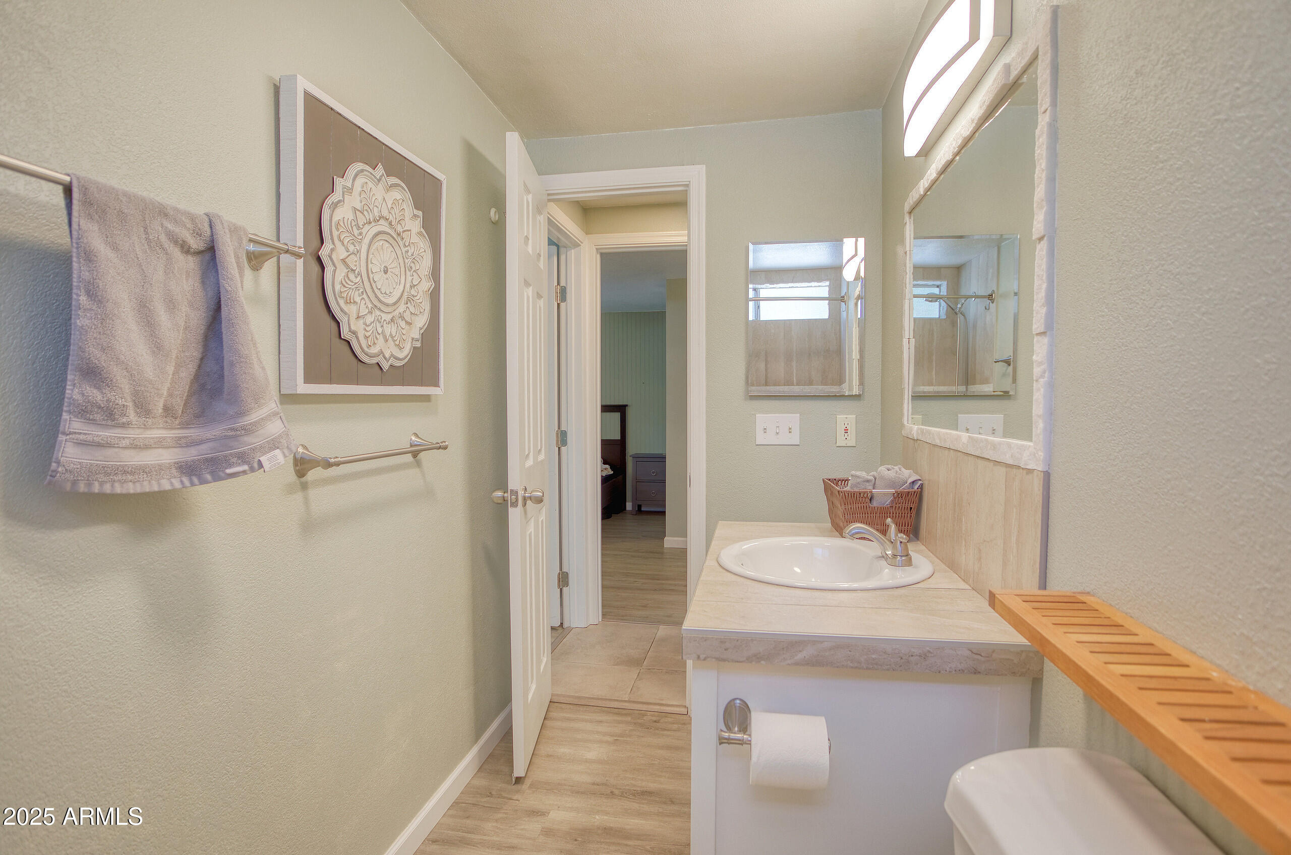 17090 Iron Springs Road Munds Park, AZ 86017 - Photo 44 of 68 a bathroom with a sink toilet and shower