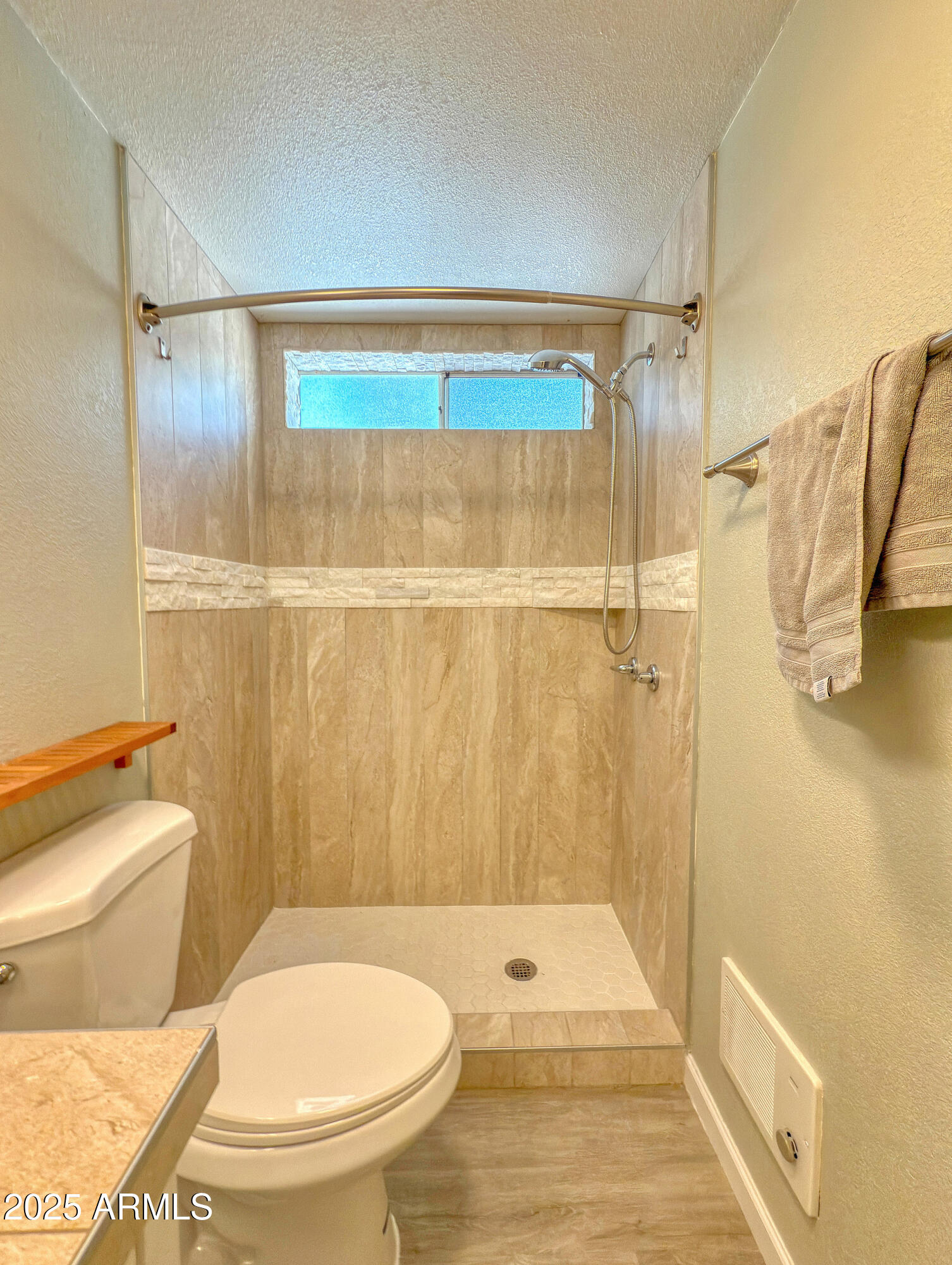 17090 Iron Springs Road Munds Park, AZ 86017 - Photo 45 of 68 a bathroom with a toilet and a shower