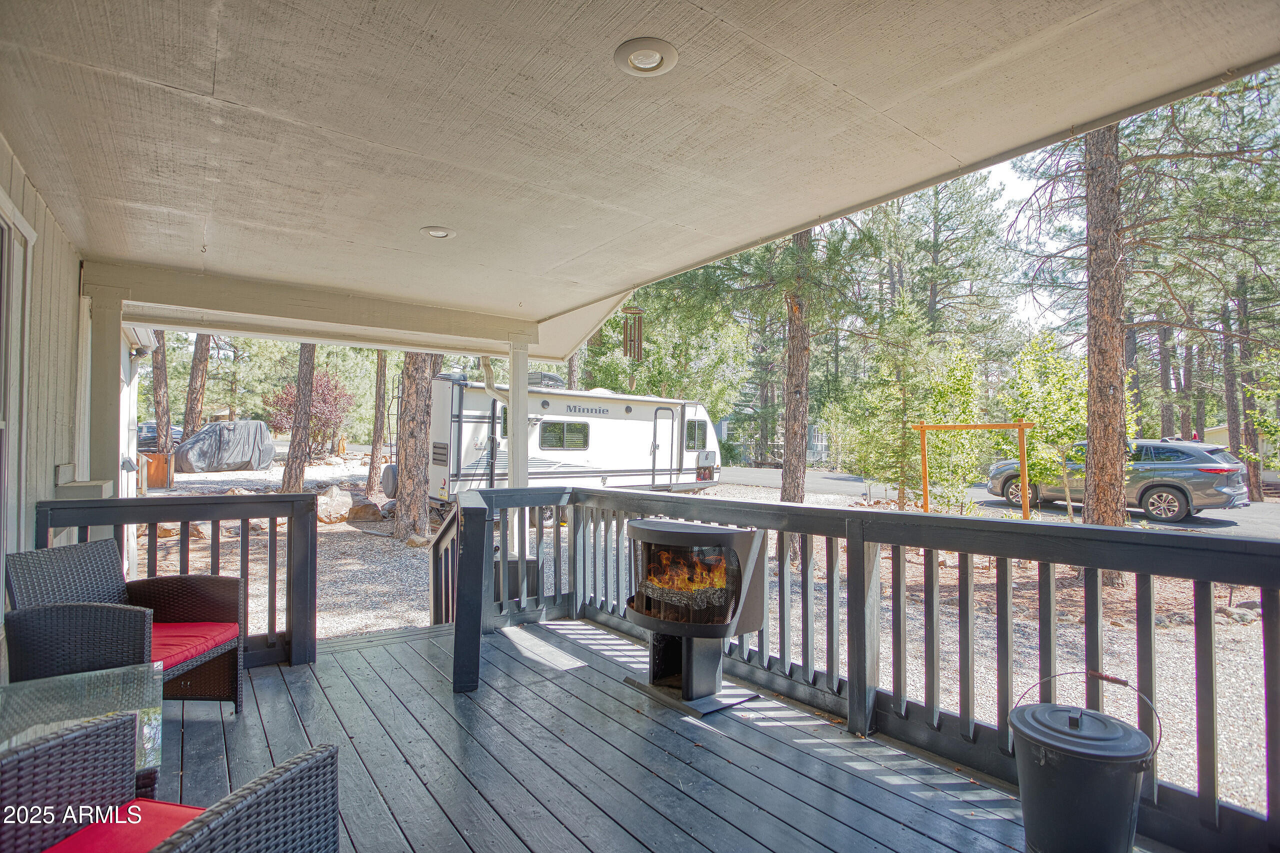 17090 Iron Springs Road Munds Park, AZ 86017 - Photo 50 of 68 a view of a dining room with furniture window and wooden floor
