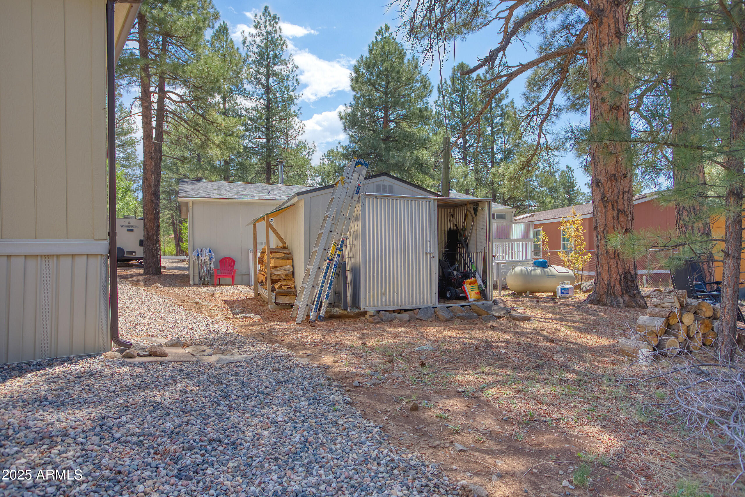 17090 Iron Springs Road Munds Park, AZ 86017 - Photo 64 of 68 a view of a house with a yard and tree