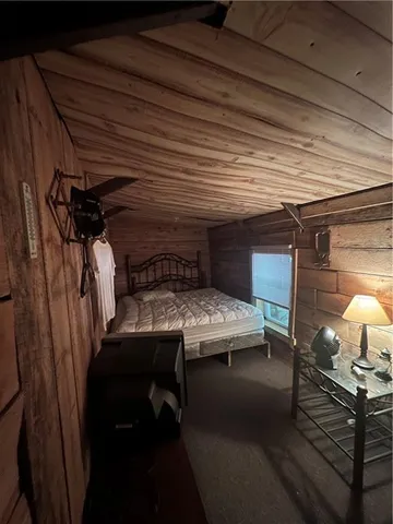 a view of a yard with large trees