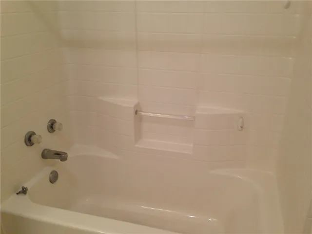 a bathroom with a bathtub