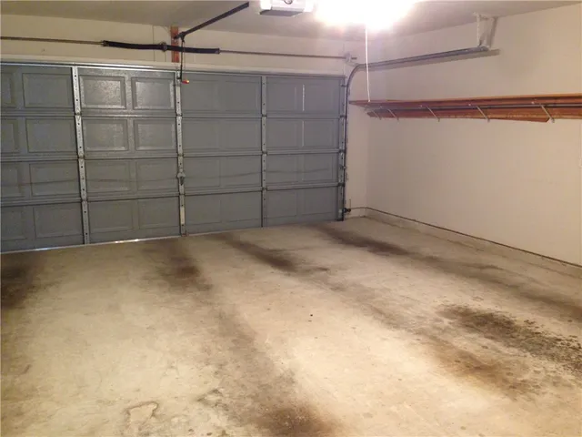 a view of yellow house with front door