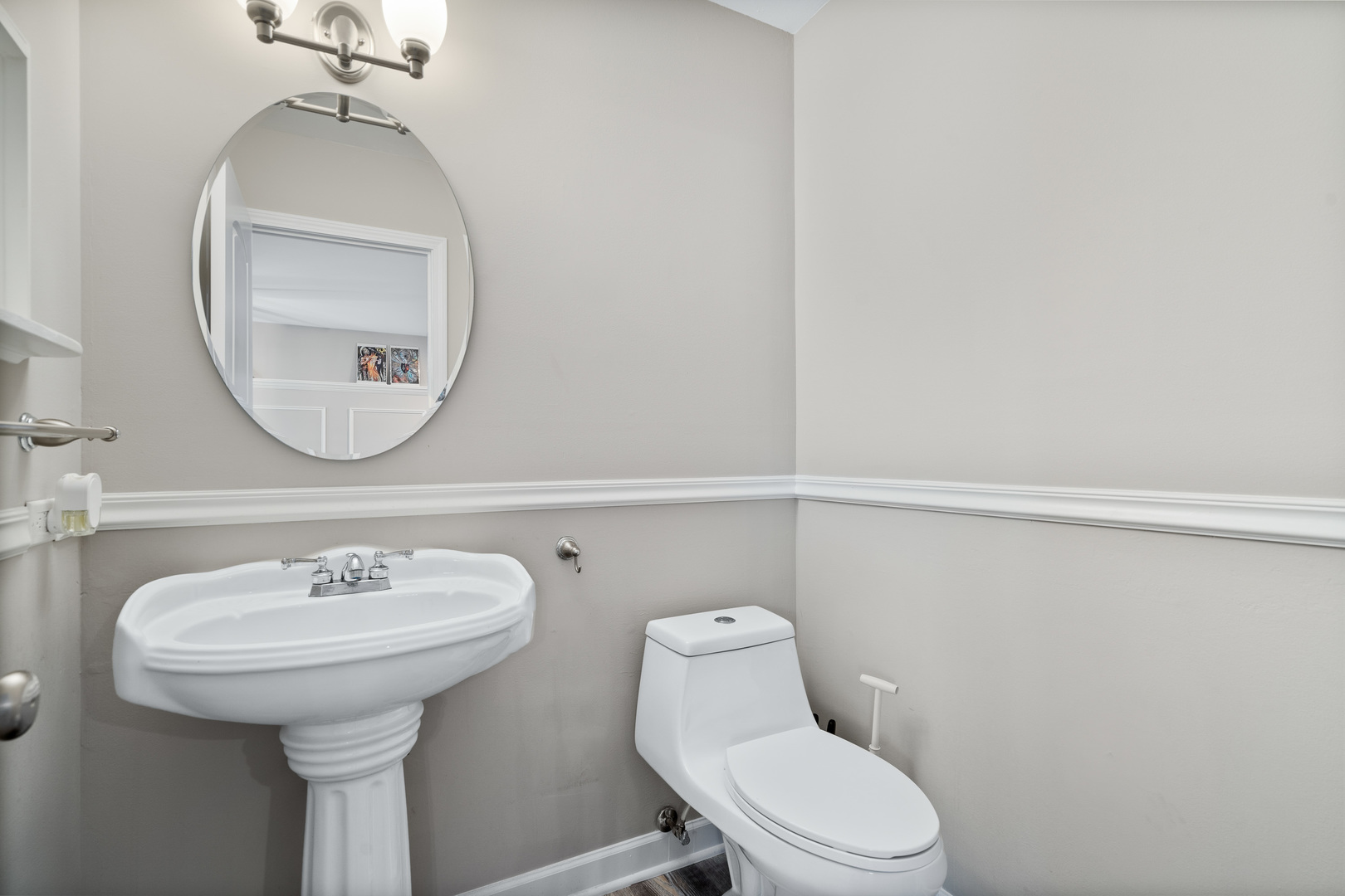 413 Ballard Drive Algonquin, IL 60102 - Photo 11 of 35 a bathroom with a toilet sink and mirror
