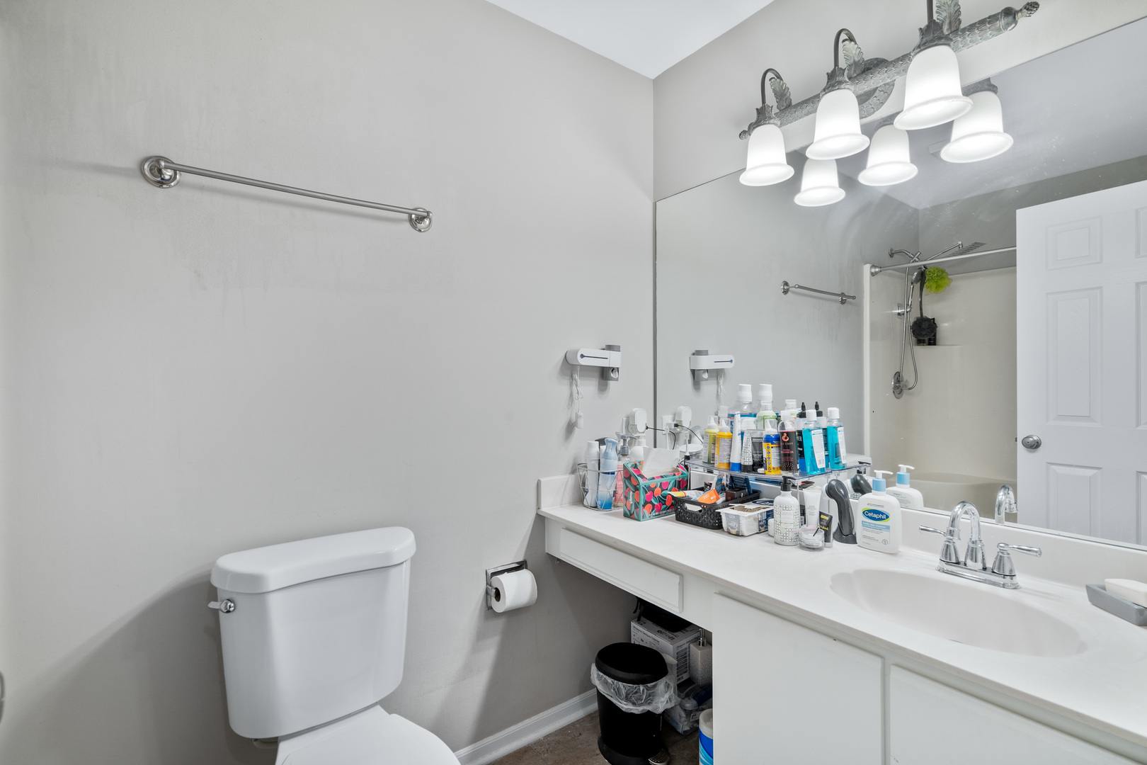 413 Ballard Drive Algonquin, IL 60102 - Photo 13 of 35 a bathroom with a toilet sink and mirror