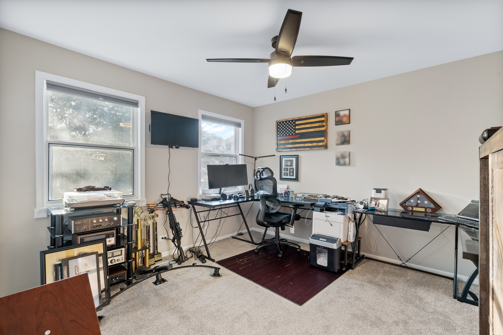 413 Ballard Drive Algonquin, IL 60102 - Photo 14 of 35 a view of a livingroom with workspace and a window