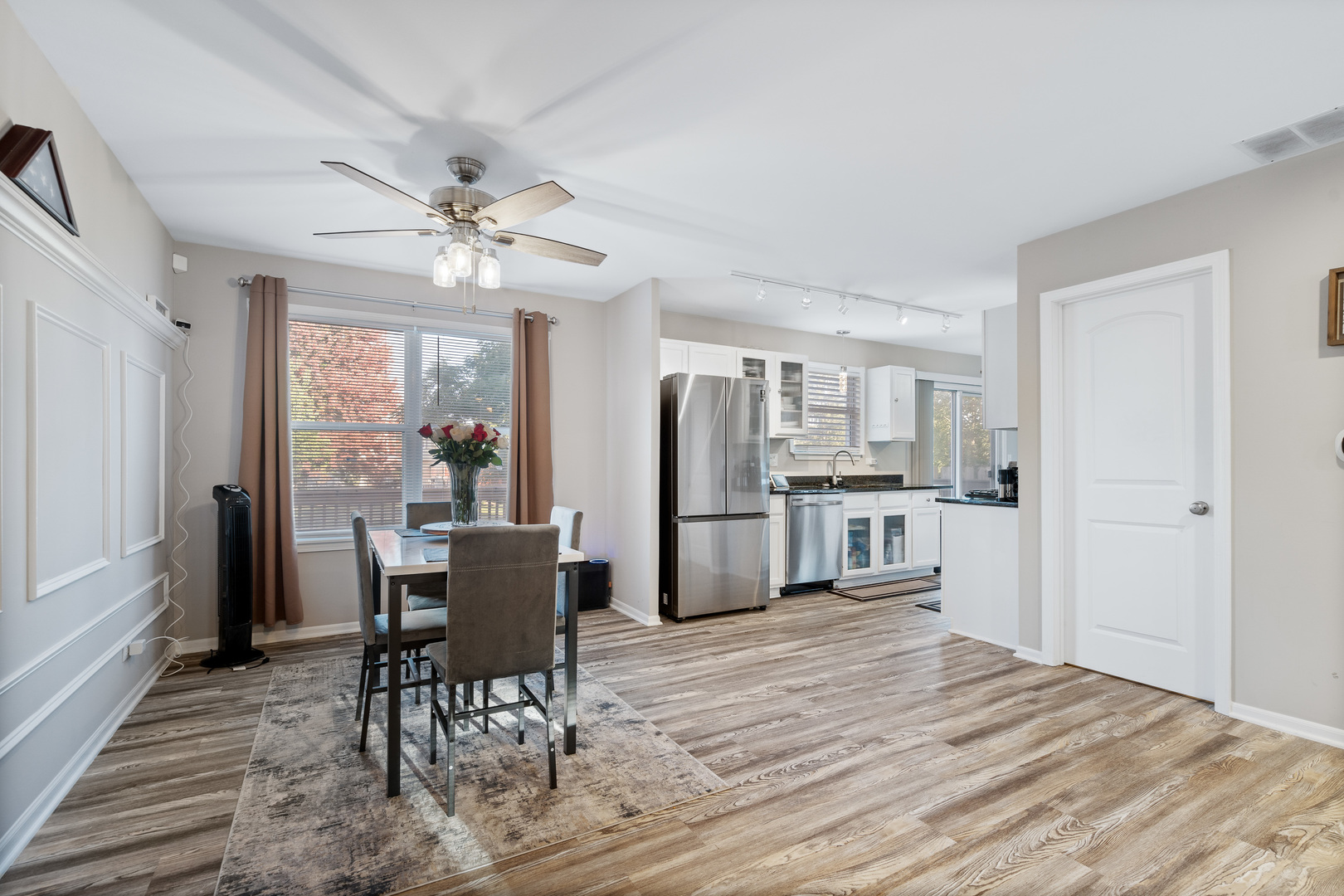 413 Ballard Drive Algonquin, IL 60102 - Photo 5 of 35 a view of a dining room with furniture window and wooden floor