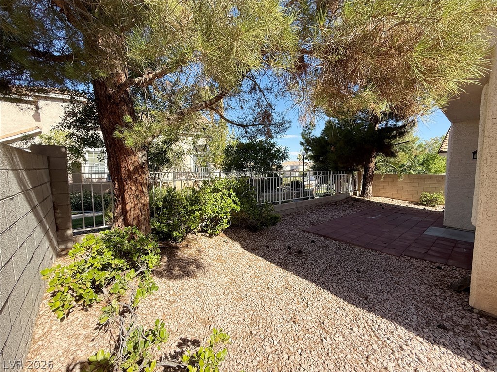 2185 Polynesia Circle Henderson, NV 89074 - Photo 35 of 37 An inviting backyard space, perfect for outdoor relaxation and quiet enjoyment.