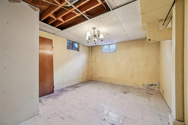 a view of a hallway with a chandelier
