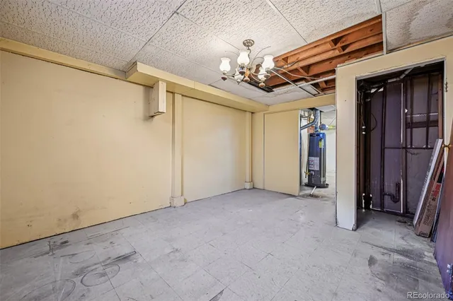 a view of a hallway with a chandelier