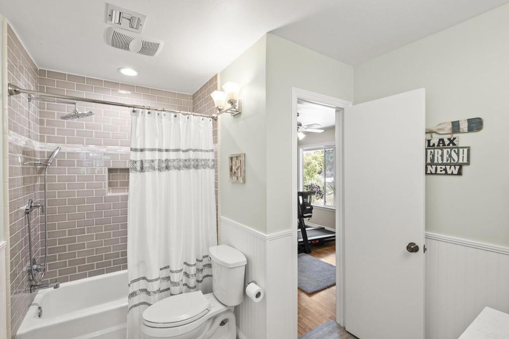1973 Felicita Road Escondido, CA 92025 - Photo 31 of 55 a bathroom with a sink toilet and shower