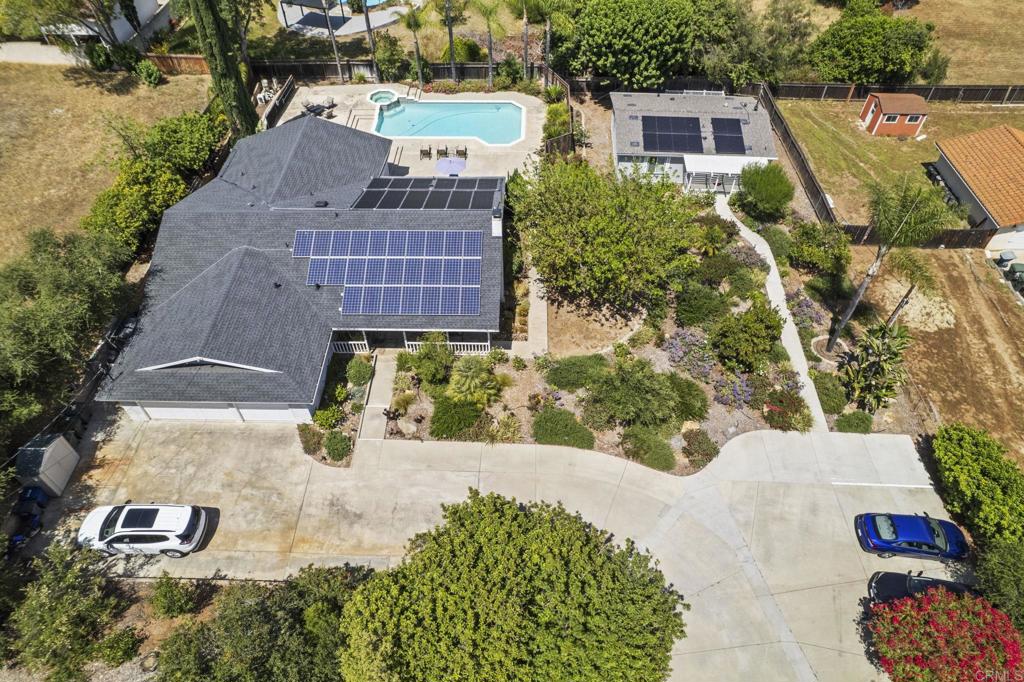 1973 Felicita Road Escondido, CA 92025 - Photo 5 of 55 an aerial view of a house with swimming pool and garden