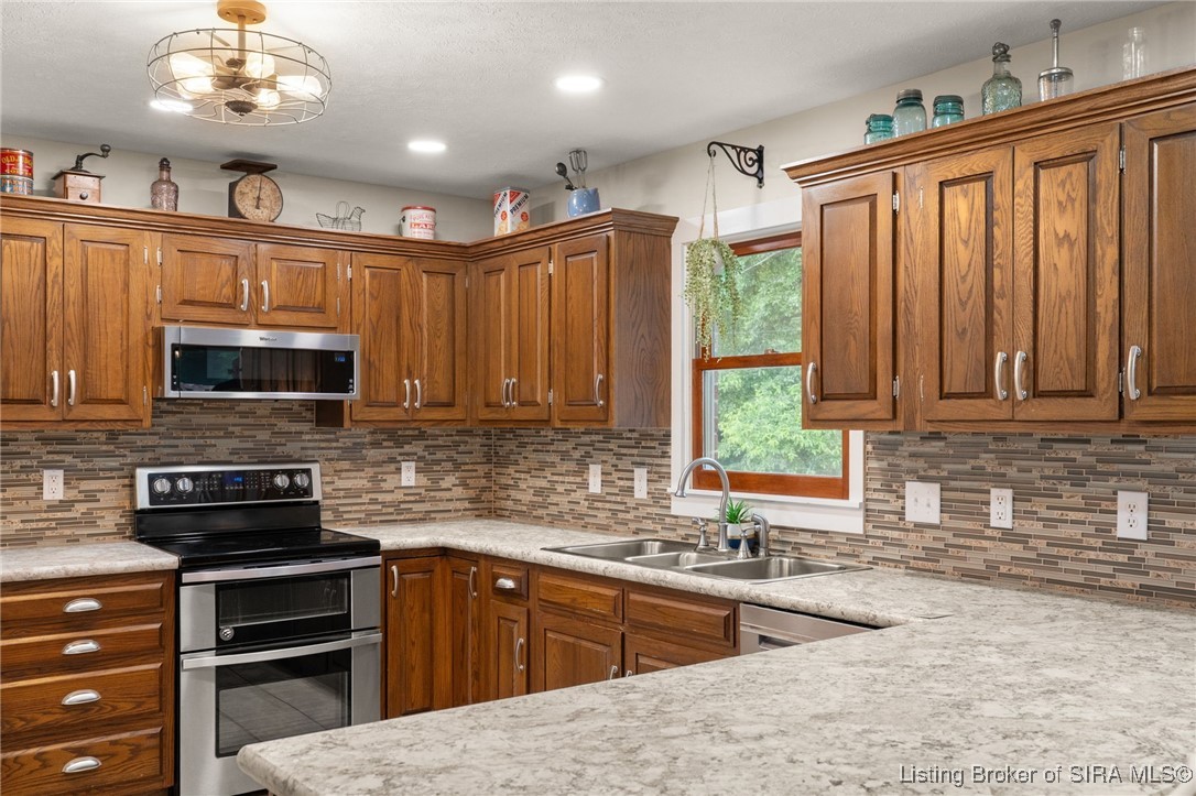 4225-4229 North Moberly Road Northwest Depauw, IN 47115 - Photo 2 of 99 Abundance of cabinets and counter space.