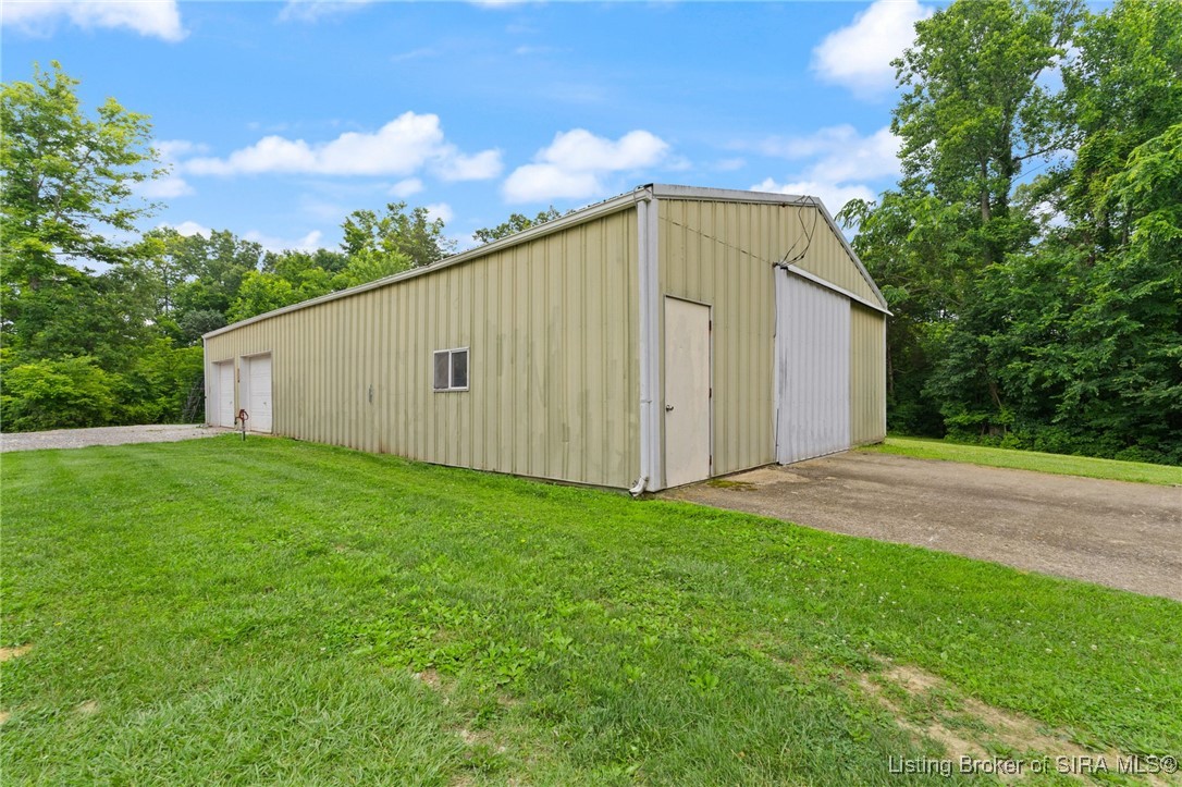 4225-4229 North Moberly Road Northwest Depauw, IN 47115 - Photo 21 of 99 HUGE detached garage - perfect for outdoor vehicles!