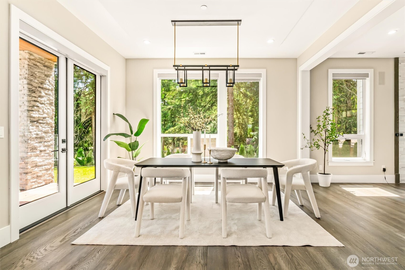 23036 35th Avenue Southeast Bothell, WA 98021 - Photo 11 of 39 a living room with furniture and a large window