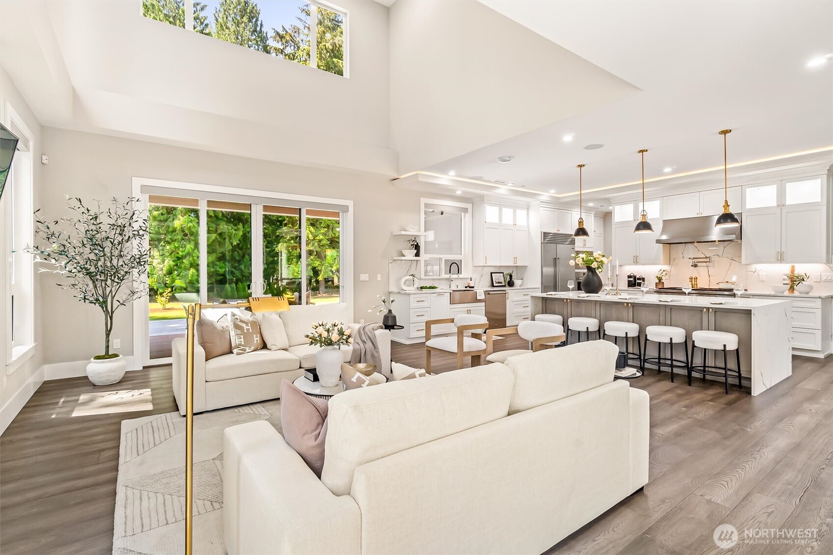 23036 35th Avenue Southeast Bothell, WA 98021 - Photo 12 of 39 a living room with furniture and a large window