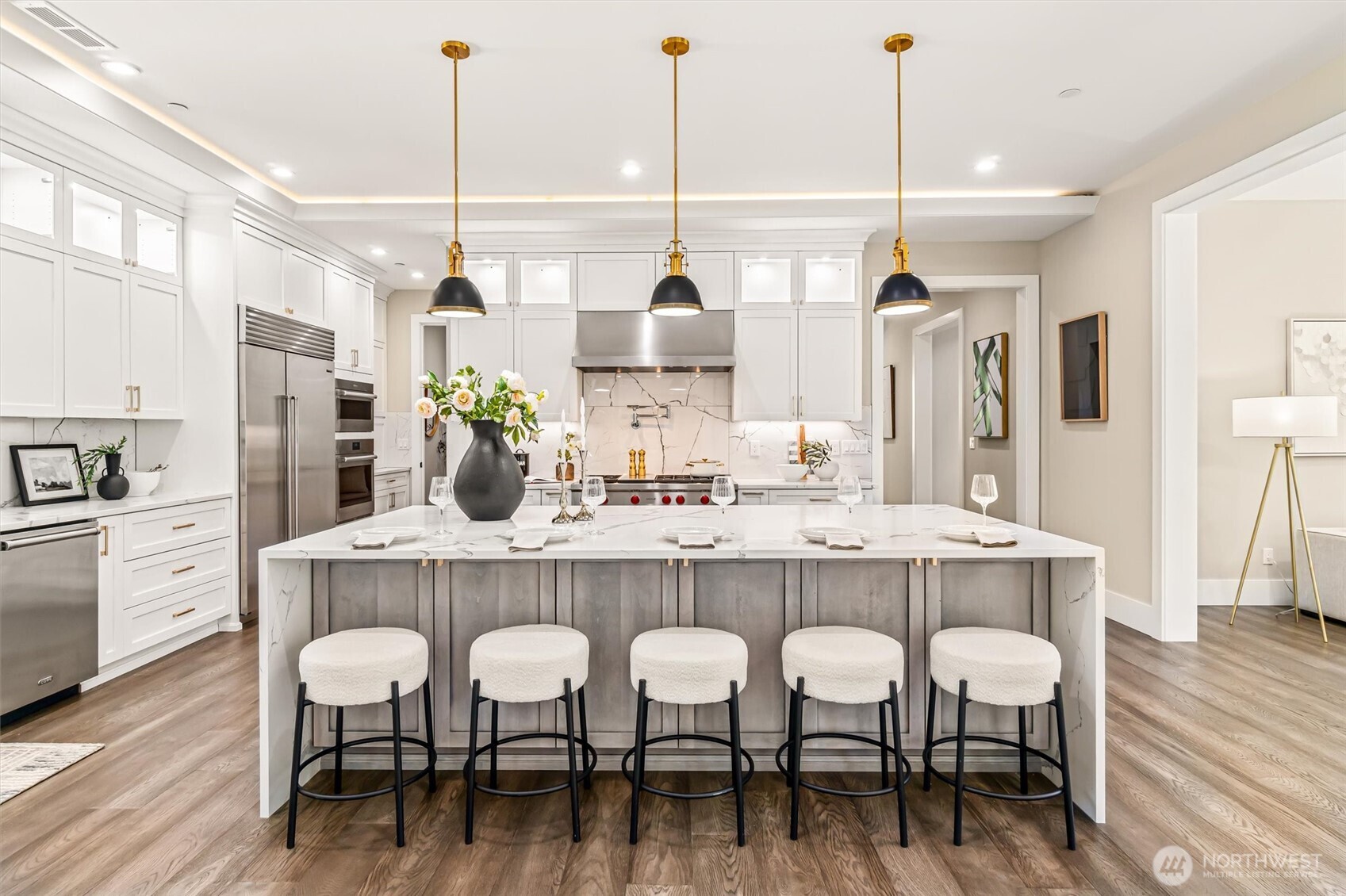 23036 35th Avenue Southeast Bothell, WA 98021 - Photo 15 of 39 a dining table chairs wooden floor and kitchen view
