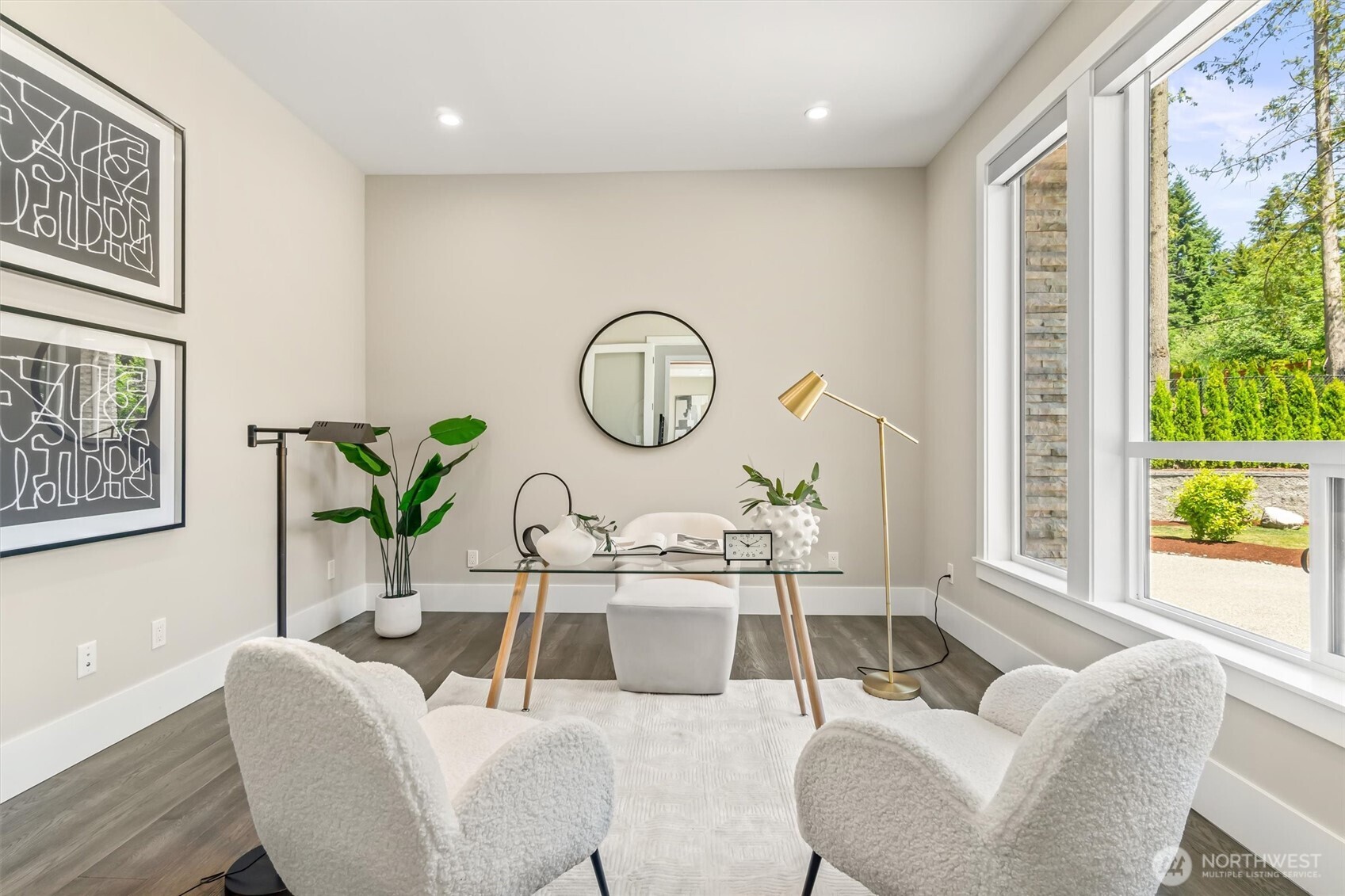23036 35th Avenue Southeast Bothell, WA 98021 - Photo 16 of 39 a living room with furniture a garden view and a large window