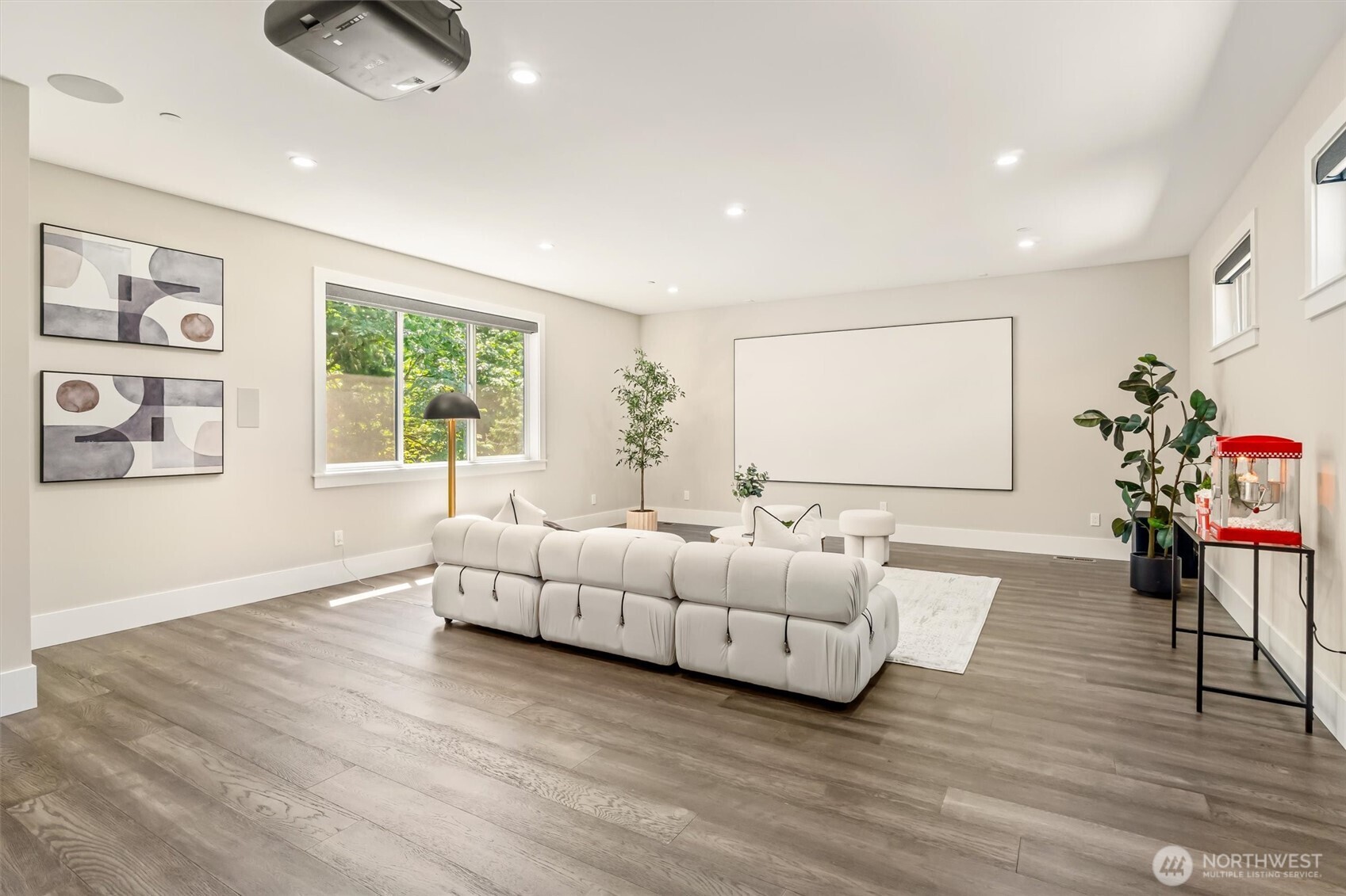 23036 35th Avenue Southeast Bothell, WA 98021 - Photo 20 of 39 a living room with furniture and a flat screen tv