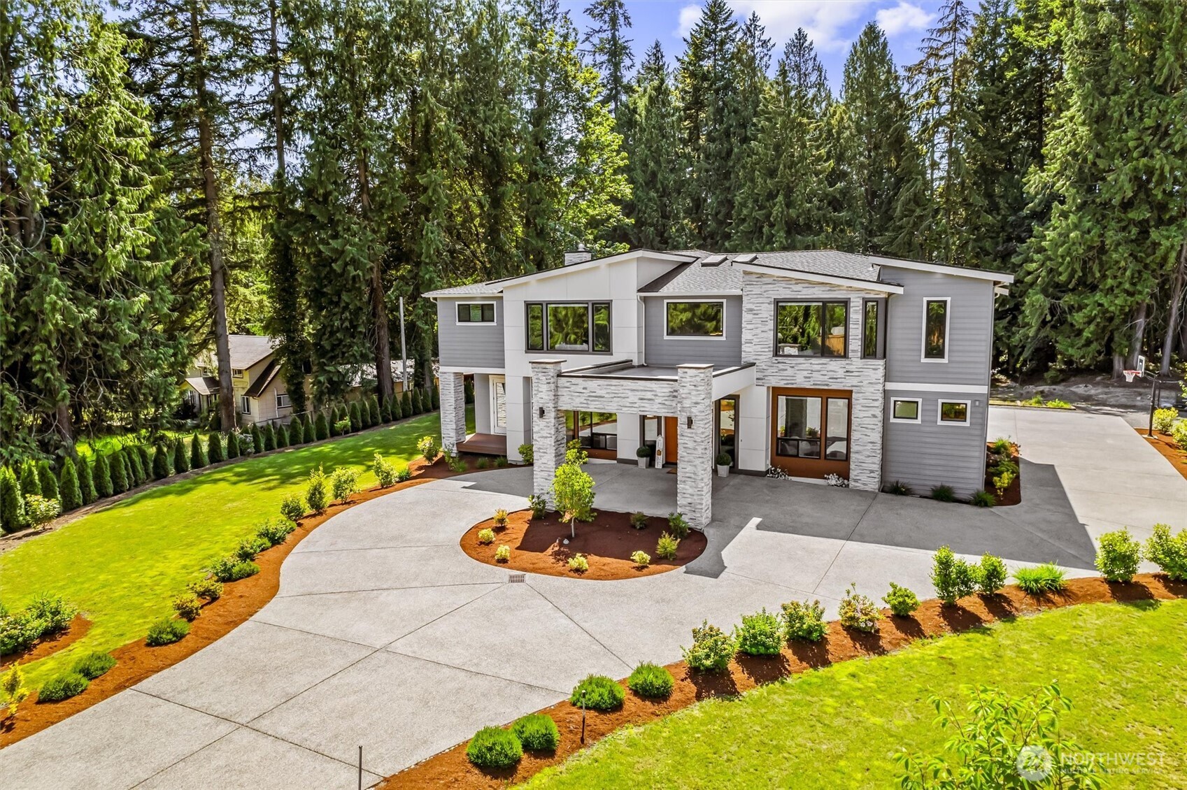 23036 35th Avenue Southeast Bothell, WA 98021 - Photo 2 of 39 a view of a house with swimming pool and garden