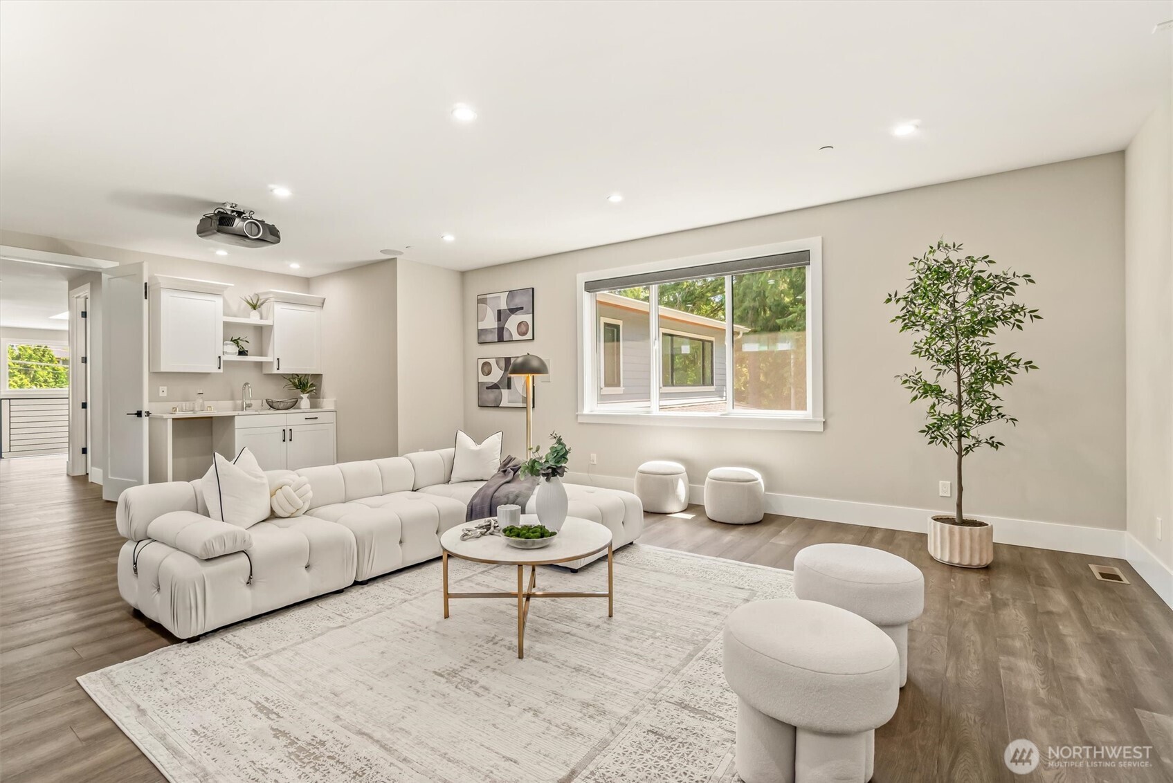 23036 35th Avenue Southeast Bothell, WA 98021 - Photo 21 of 39 a living room with furniture and a potted plant