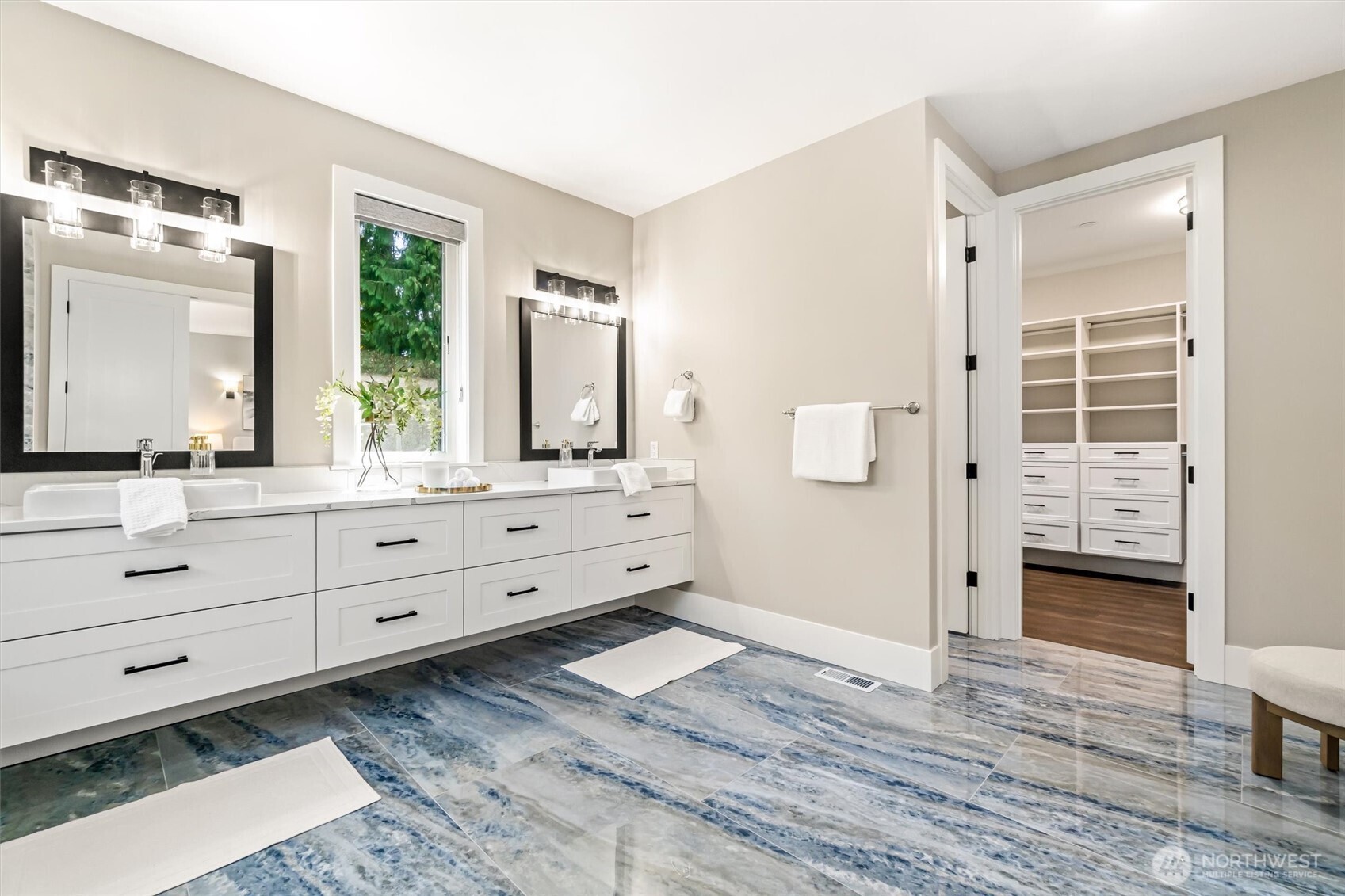 23036 35th Avenue Southeast Bothell, WA 98021 - Photo 24 of 39 a bathroom with a shower sink and mirror
