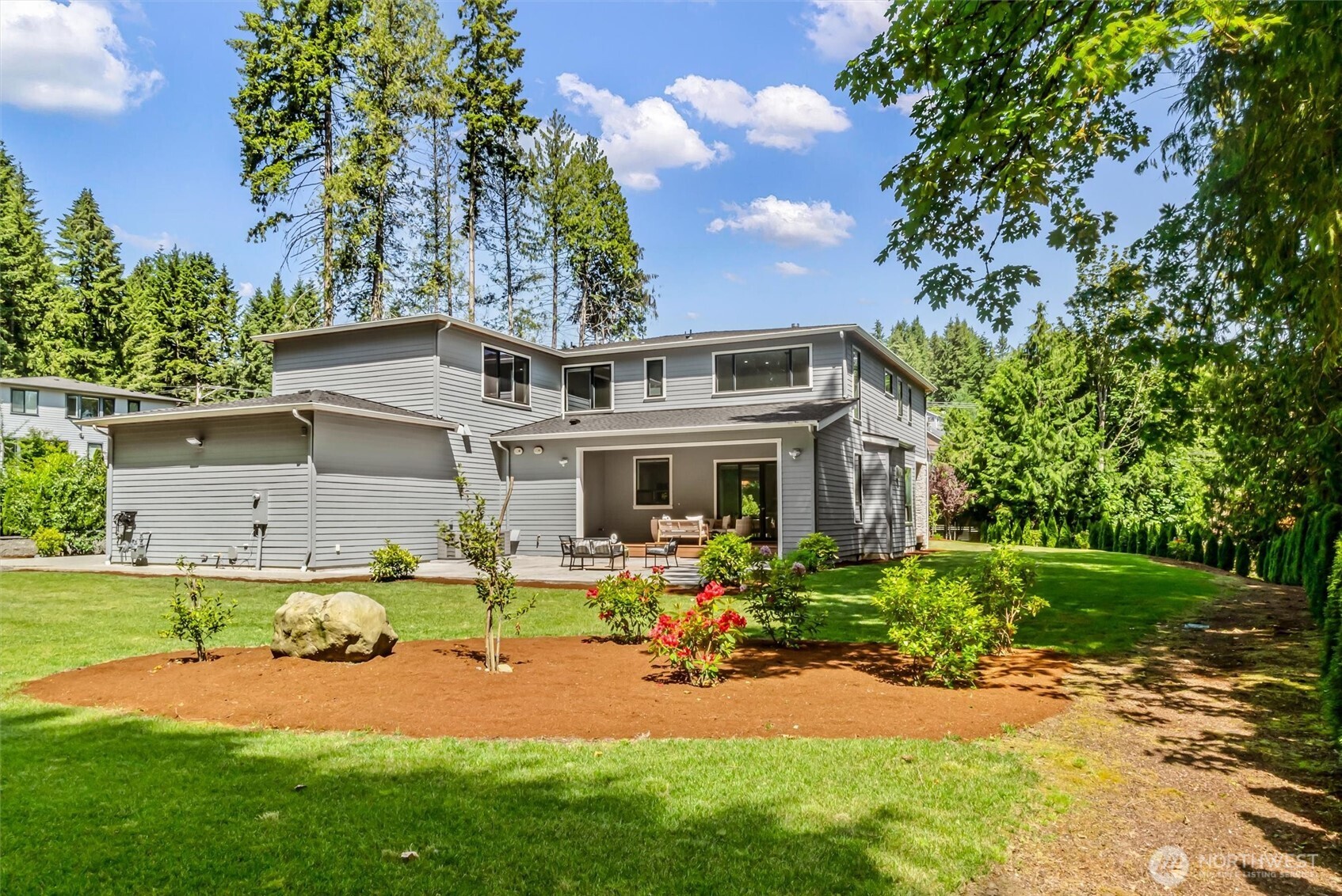23036 35th Avenue Southeast Bothell, WA 98021 - Photo 34 of 39 a view of a house with backyard and sitting area