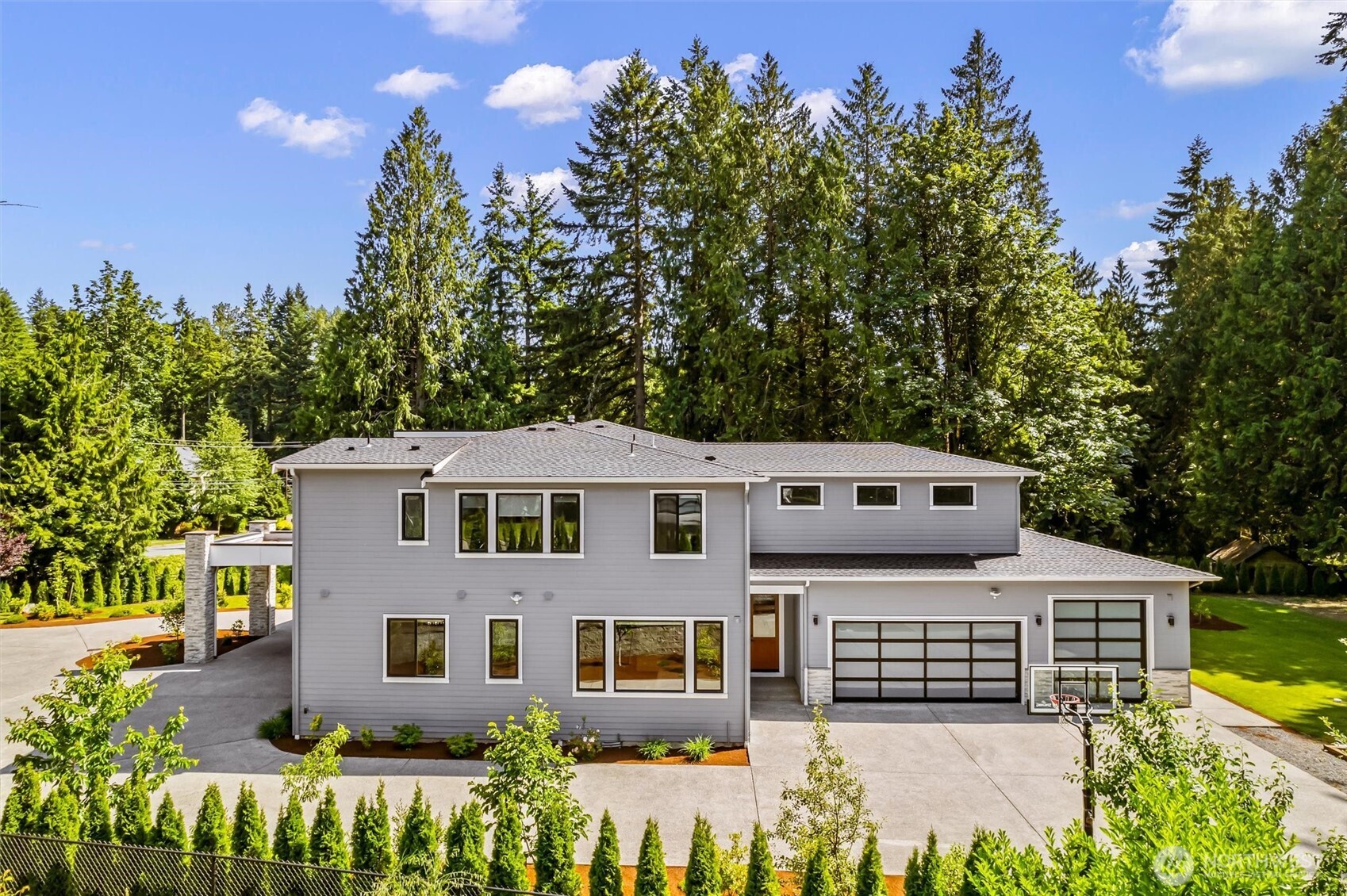 23036 35th Avenue Southeast Bothell, WA 98021 - Photo 35 of 39 front view of a house with a garden