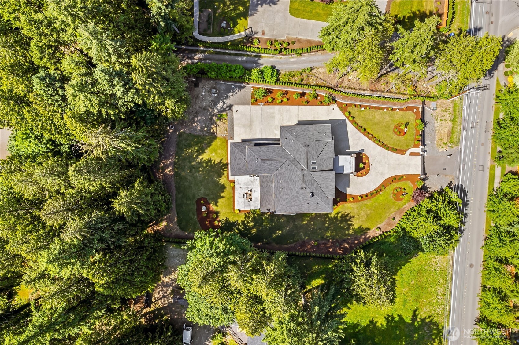 23036 35th Avenue Southeast Bothell, WA 98021 - Photo 39 of 39 an aerial view of a house with a yard and swimming pool