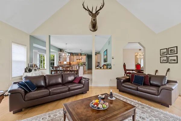 a living room with furniture and a table