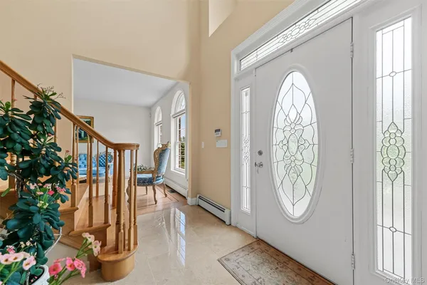 a view of a entryway door with wooden floor