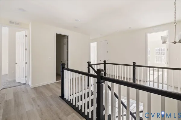 a view of staircase with rug floor