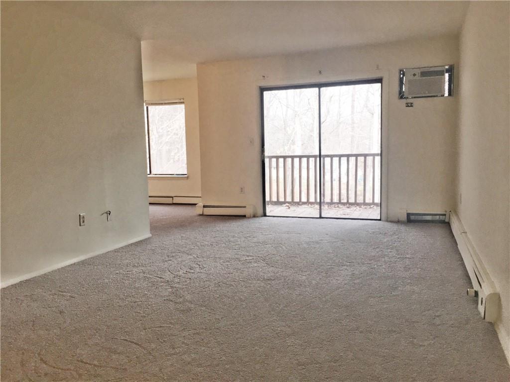 3 Hook Road, Unit 56J Poughkeepsie, NY 12601 - Photo 1 of 1 an empty room with windows