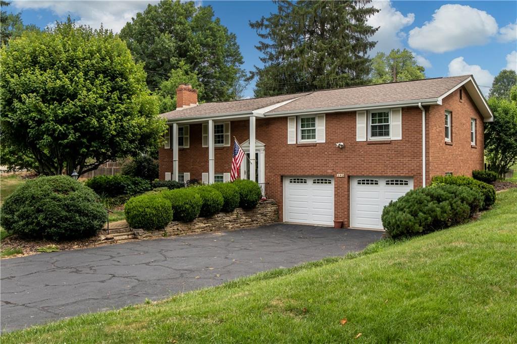 Solid brick Classic Beauty with plenty of curb appeal.  Level driveway makes winters a breeze!