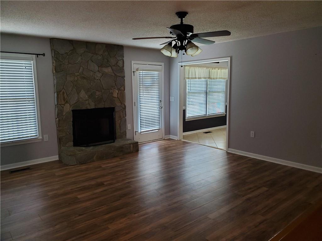 3817 River Road Hickory, NC 28602 - Photo 3 of 13 a view of an empty room with wooden floor and a window