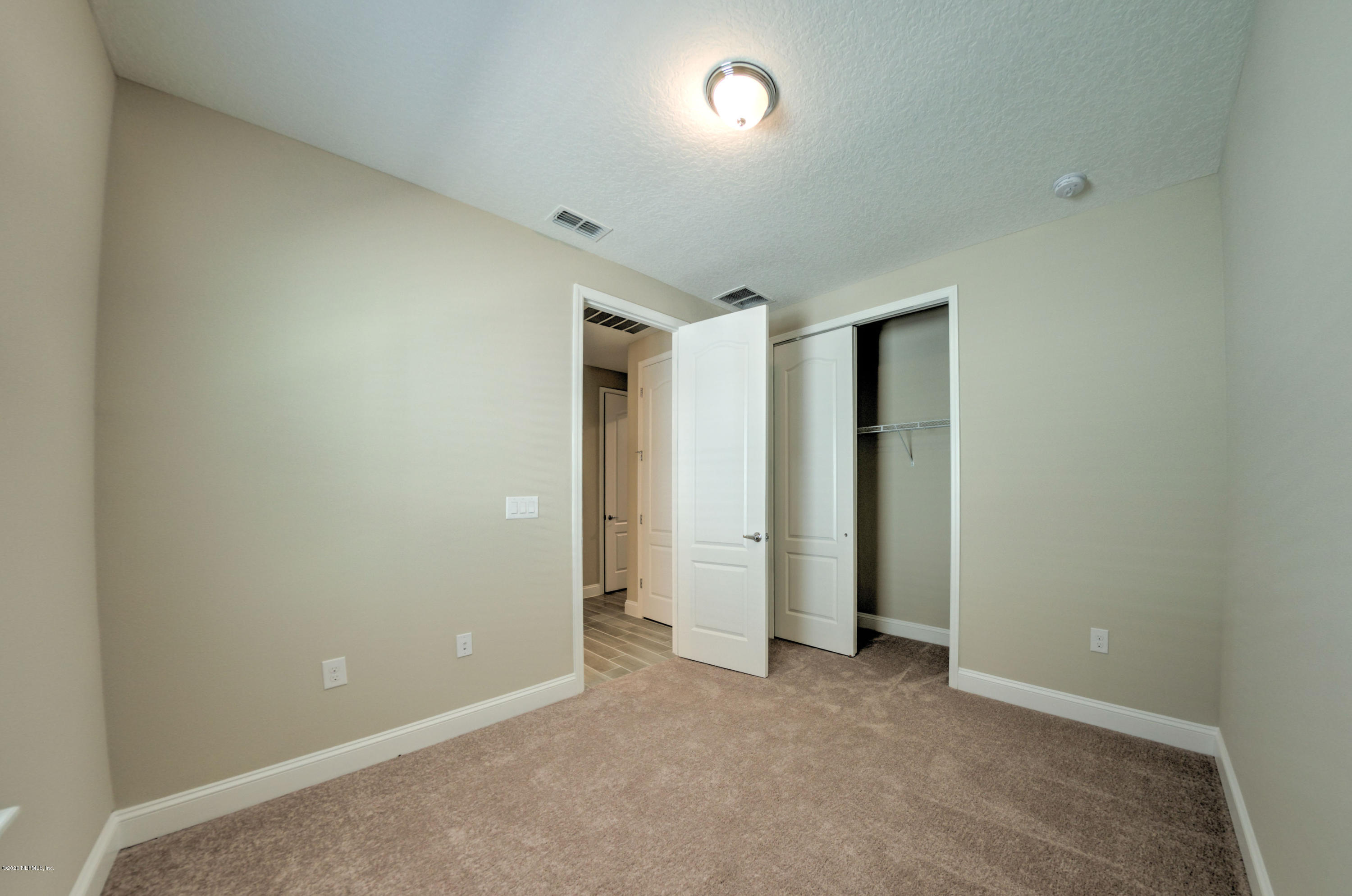 75 Dade Court St. Augustine, FL 32092 - Photo 8 of 25 an empty room with closet area