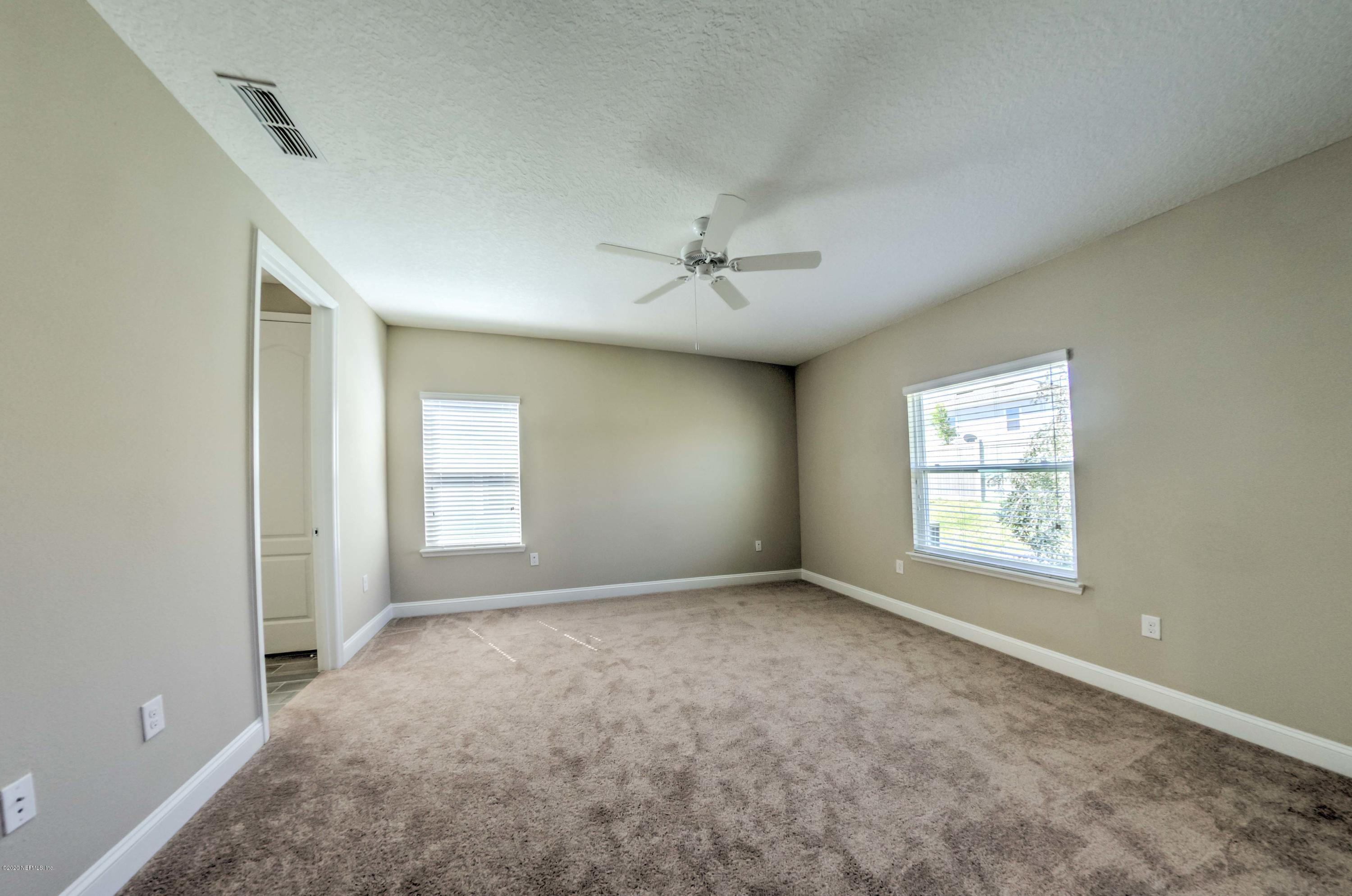 75 Dade Court St. Augustine, FL 32092 - Photo 10 of 25 a view of an empty room with a window