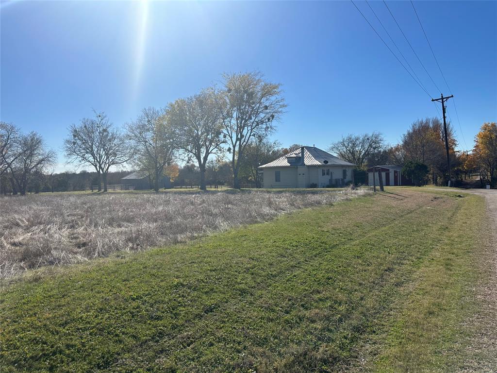 531 Wright Road Waxahachie, TX 75167 - Photo 12 of 20 a view of a field with trees in background