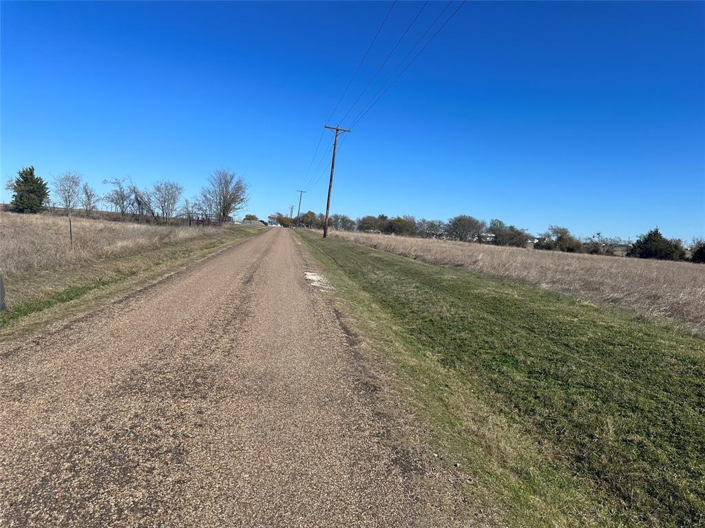 531 Wright Road Waxahachie, TX 75167 - Photo 17 of 20 a view of a road with a yard