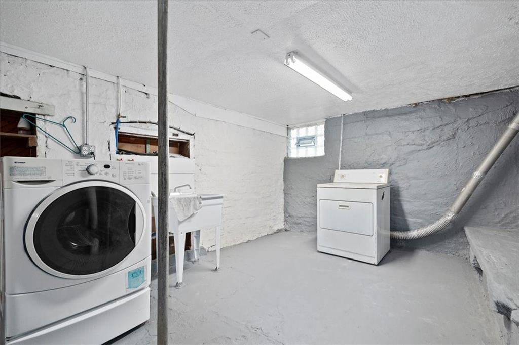 3212 Millers Run Road Cecil, PA 15321 - Photo 21 of 25 a utility room with dryer and washer