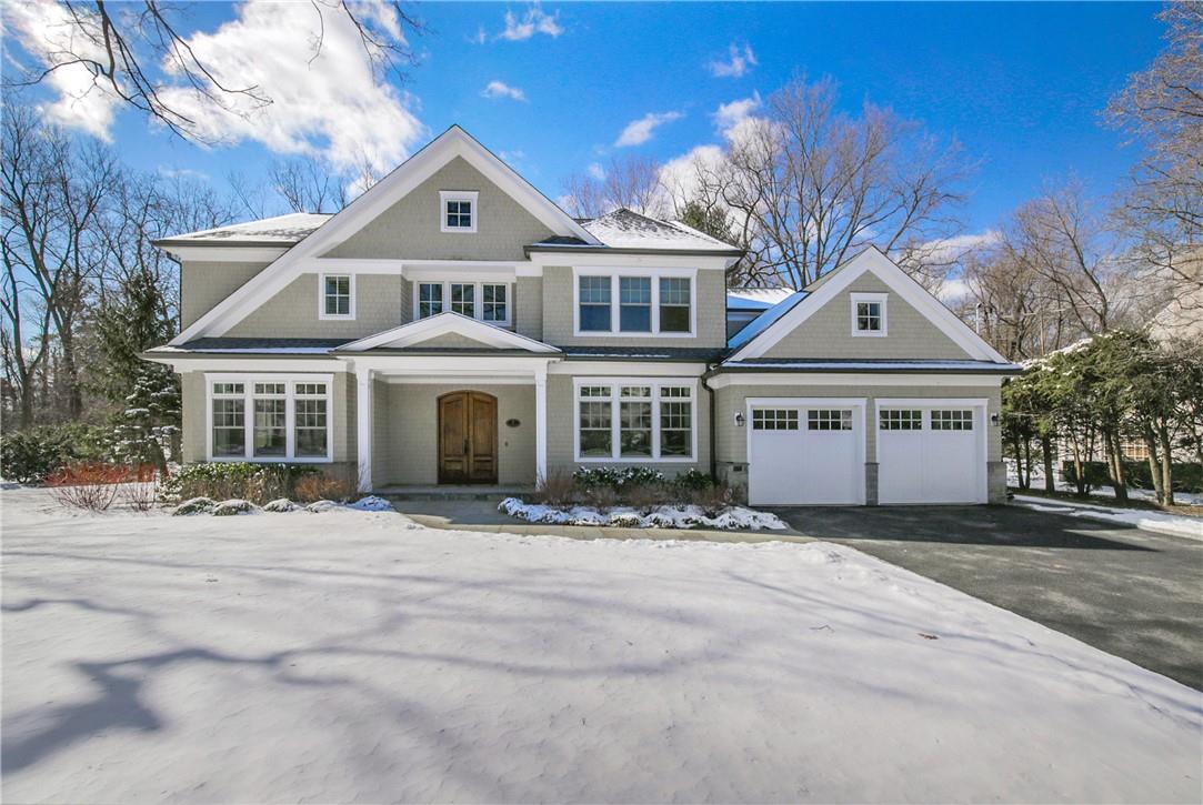 7 Meadow Road Scarsdale, NY 10583 - Photo 1 of 1 a front view of a house with a yard