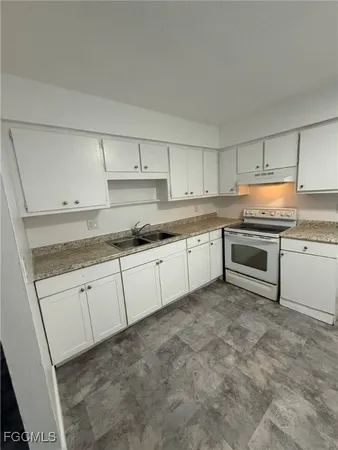 a view of a room with window and stairs