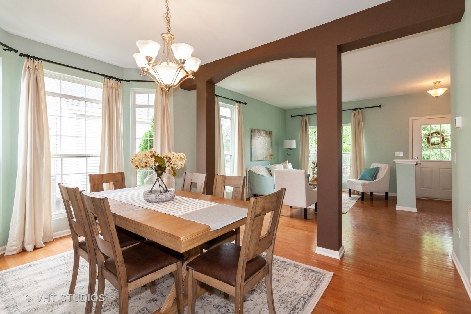 317 Stonegate Road Bolingbrook, IL 60440 - Photo 4 of 23 a view of a dining room with furniture and wooden floor