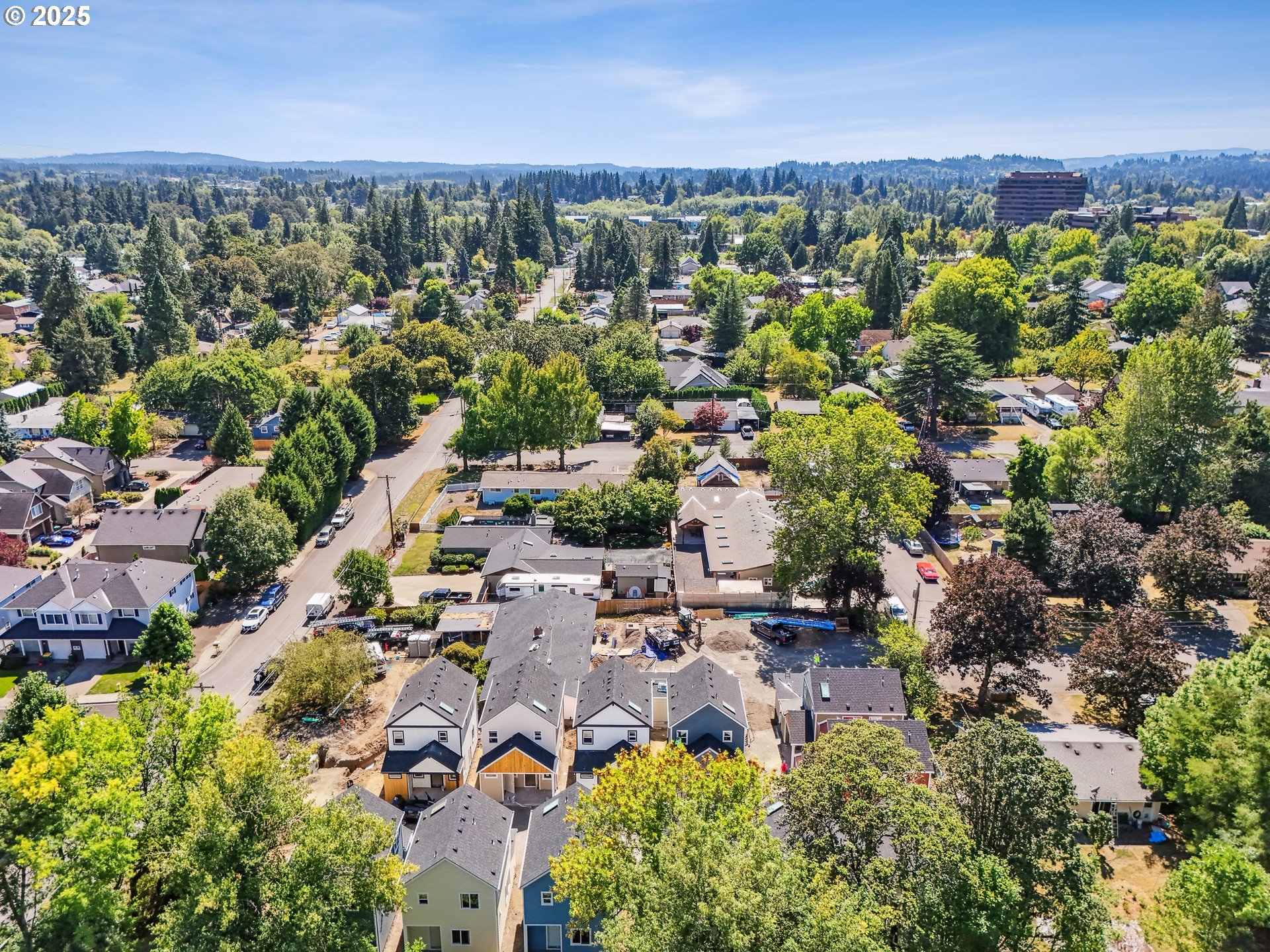 9596 Southwest 91st Avenue, Unit 12 Portland, OR 97223 - Photo 16 of 25 an aerial view of a city with lots of residential buildings