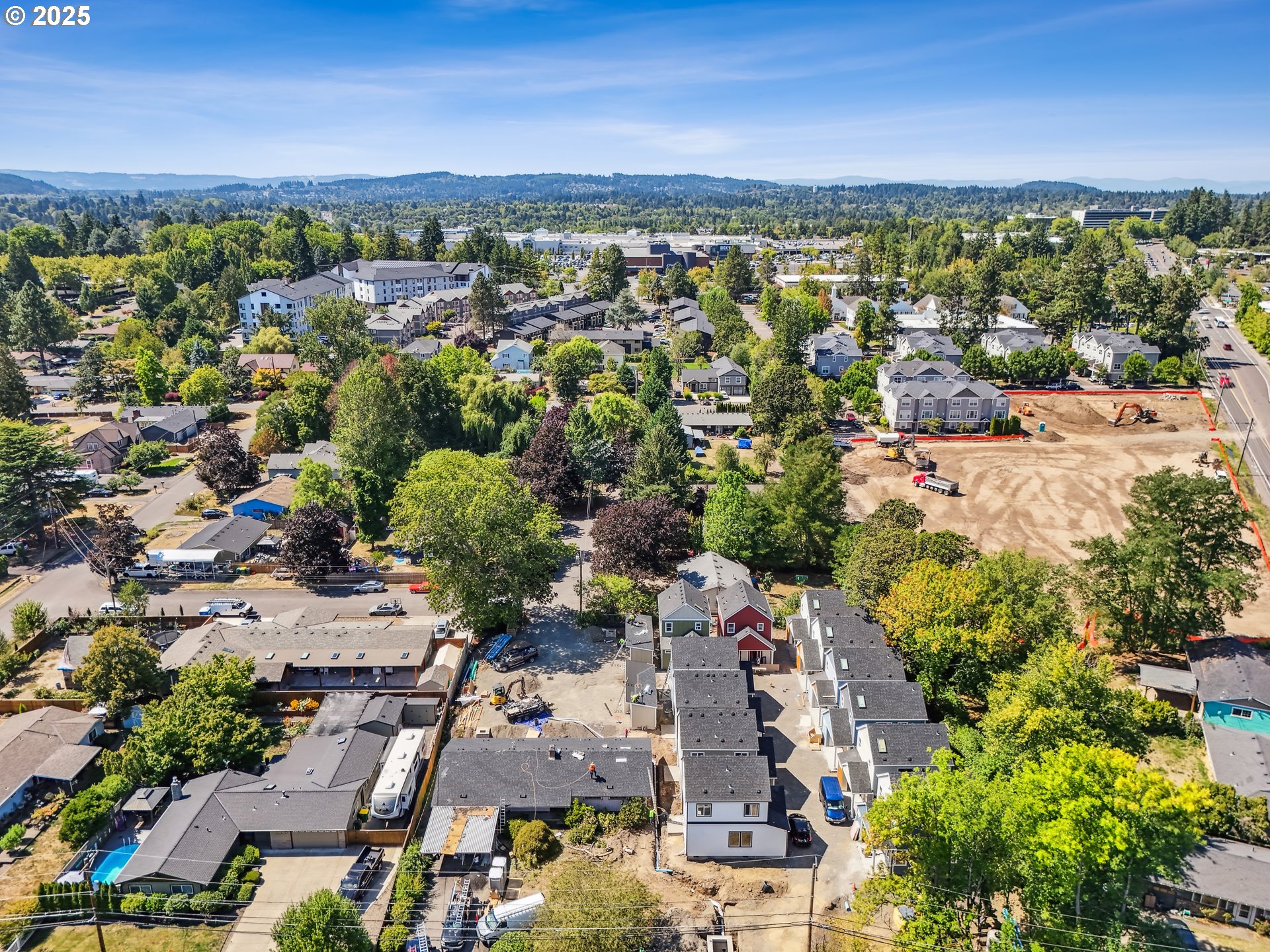9596 Southwest 91st Avenue, Unit 12 Portland, OR 97223 - Photo 23 of 25 an aerial view of a city with lots of residential buildings