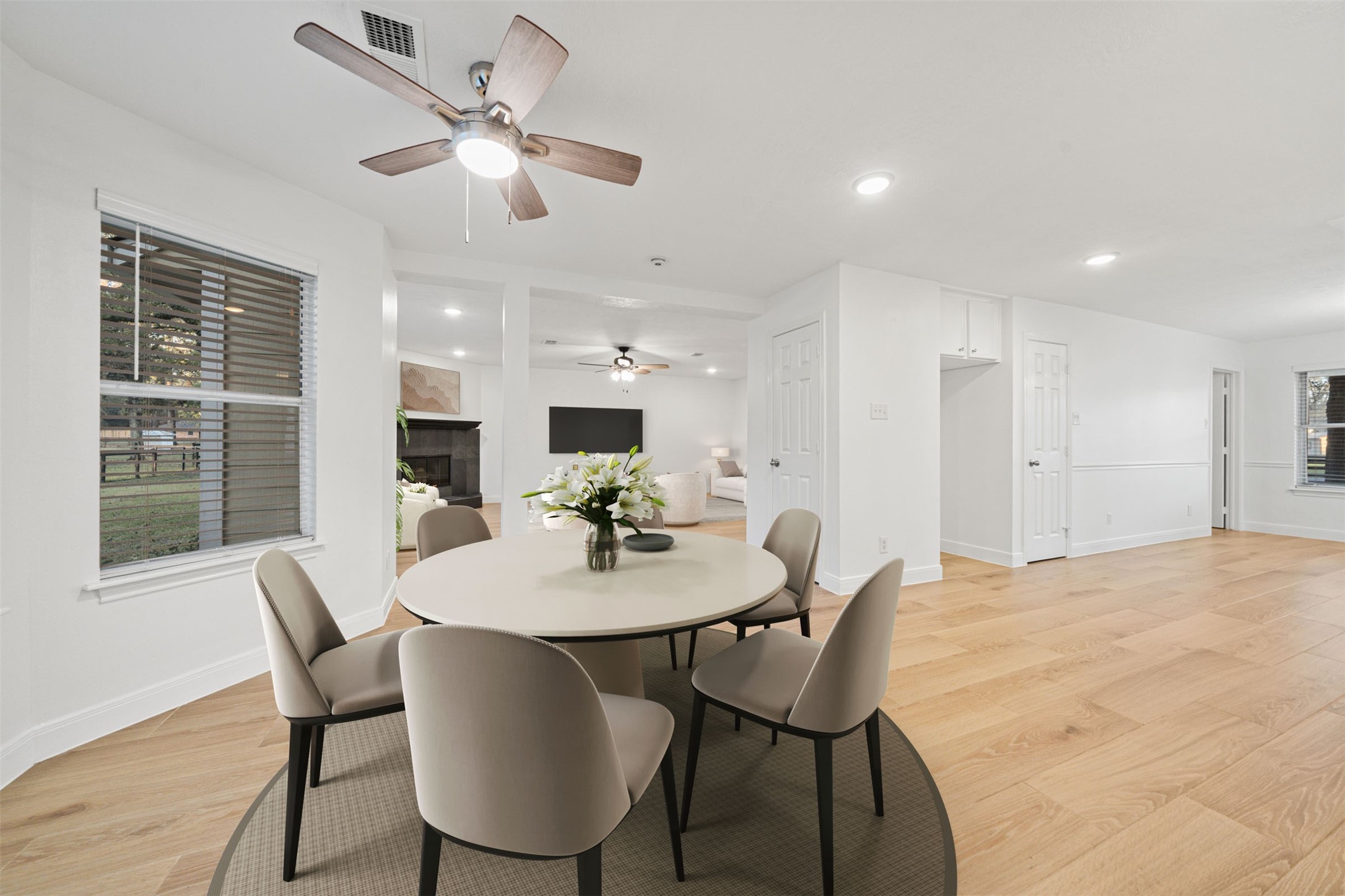 22323 Roberts Cemetery Road Hockley, TX 77447 - Photo 16 of 50 a view of a dining room with furniture window and wooden floor
