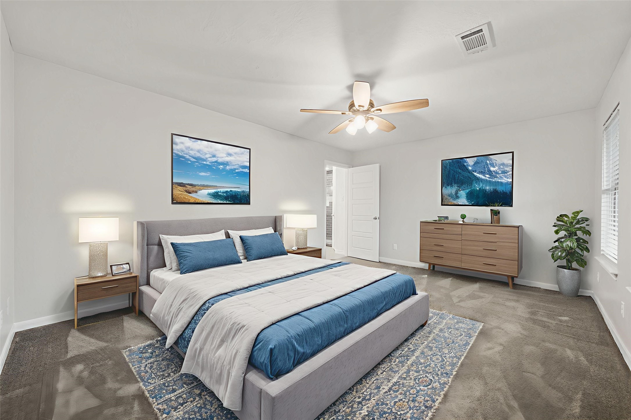 22323 Roberts Cemetery Road Hockley, TX 77447 - Photo 19 of 50 a bedroom with bed and a chandelier