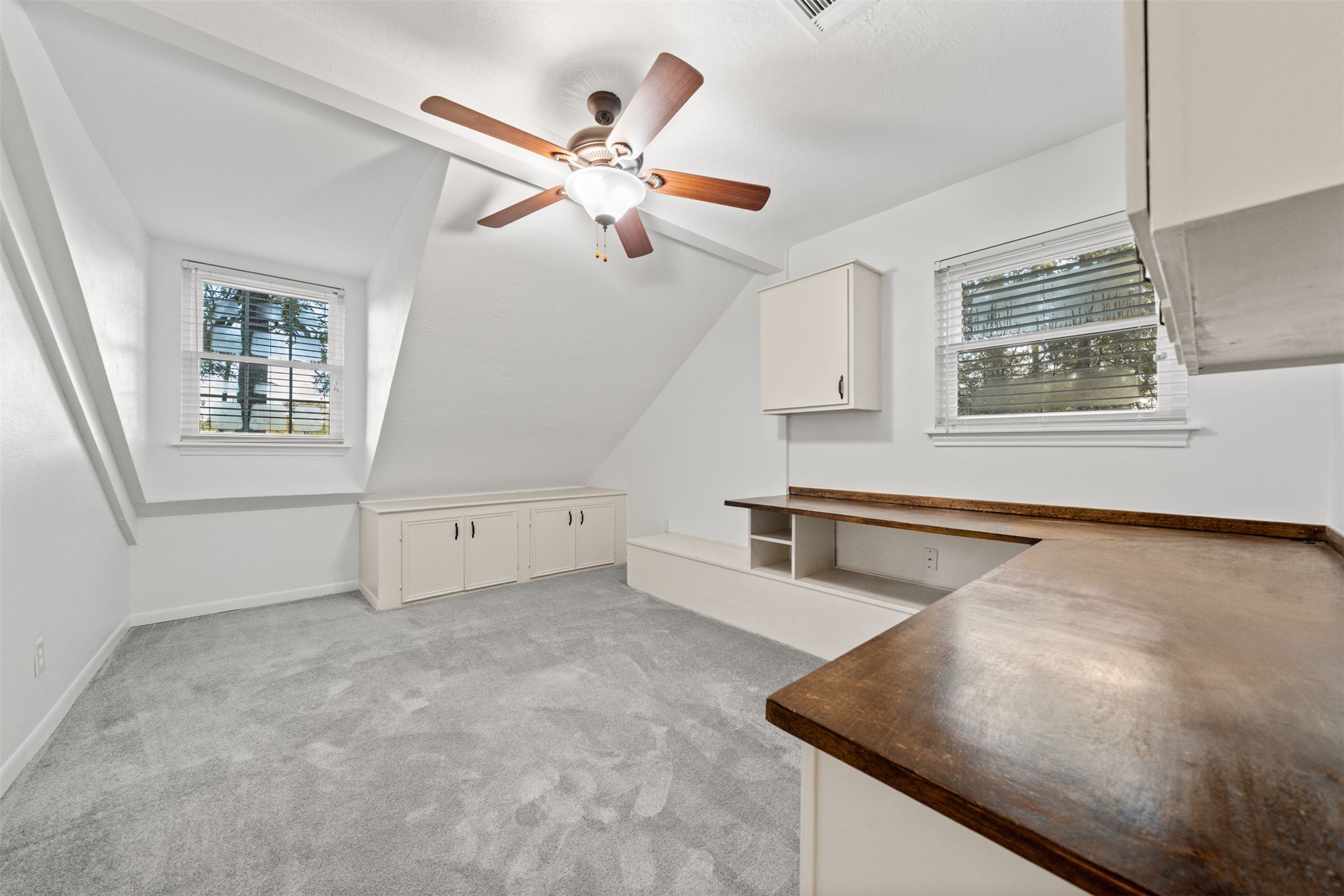 22323 Roberts Cemetery Road Hockley, TX 77447 - Photo 24 of 50 a view of a livingroom with wooden floor and a ceiling fan