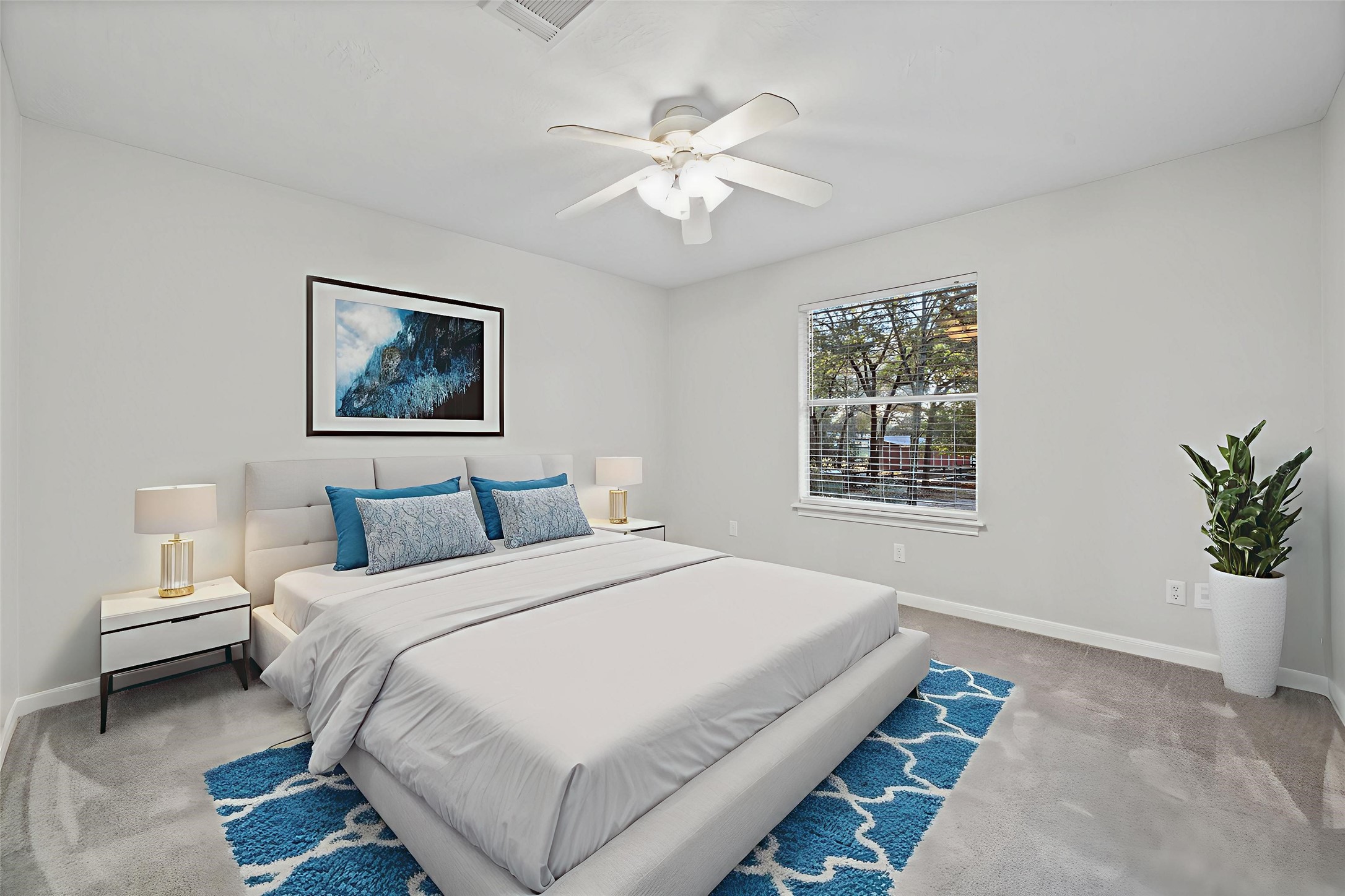 22323 Roberts Cemetery Road Hockley, TX 77447 - Photo 26 of 50 a bedroom with a large bed and a window